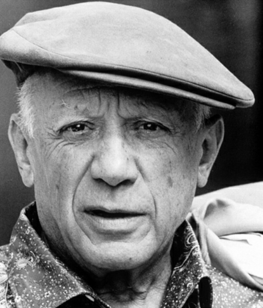 Black and white portrait of an elderly man wearing a flat cap, with a serious expression and detailed facial features, dressed in a patterned shirt.