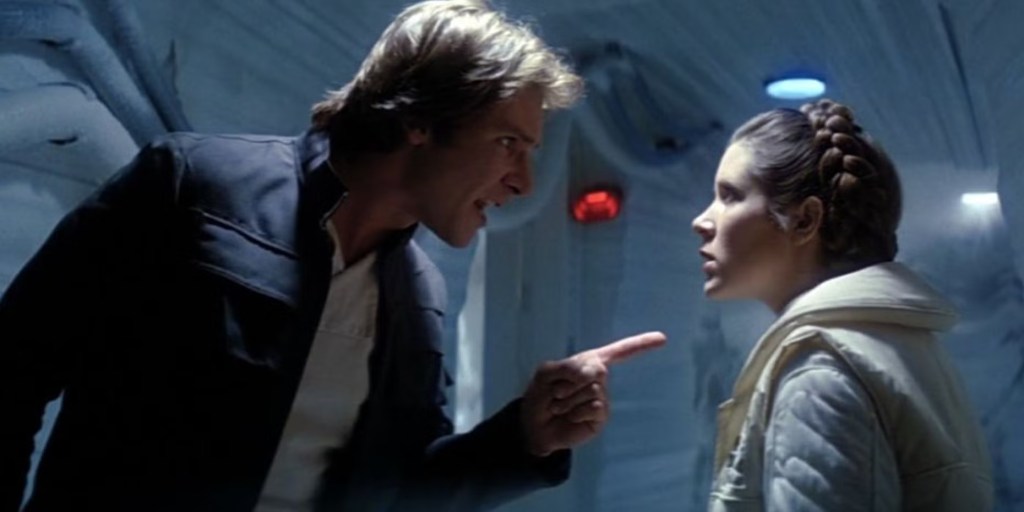 A tense confrontation between two characters in a sci-fi setting, with one character pointing assertively while the other looks back in defiance.